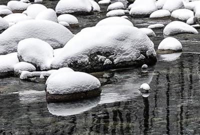 Boulders covered in snow